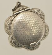 Silver George V compact of flower design, engraved with mirror