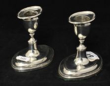 Pair Edwardian silver short candlesticks on oval bases, 9cm