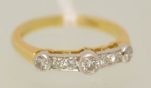 18ct gold ring set with seven modern round brilliant cut diamonds, size, M