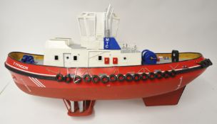 A scale model tug boxed, Voith Schneider twin tug 1:32 with vertical propulsion system and twin