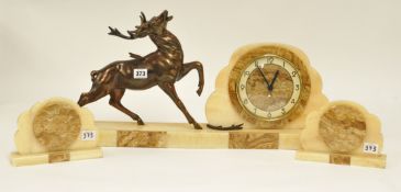 An Art Deco style marble clock garniture surmounted with bronze effect animal, a/f,  32cm high