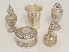 Five silver items including engraved beaker, circular ornate box, two pepper pots including