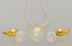 Modern Lalique jewellery comprising a glass and yellow metal pendant and earrings, boxed,