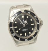 A Gents Rolex Oyster Submariner wrist watch with black dial and black bezel, 1964 model in stainless