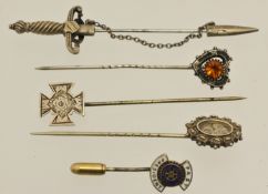 Five silver stick pins including Maltese Cross, sword etc