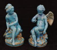 A 19th century pair of pottery glazed figures, 23cm high