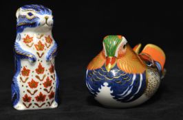 Two Royal Crown Derby Paperweights Otter and Nesting Bird, gold and silver stoppers, tallest 11cm