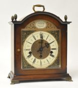A reproduction bracket clock with German chiming movement 35cm high (together with original