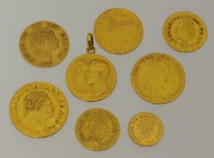 Seven various gold coins and one gilt coin,  and medallions including 1820 sovereign, 1864 half