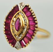 9ct ruby style and diamond ring on of oval form with baguette and round cut stones size, K
