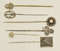 Six silver assorted stick pins