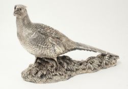 A modern silver sculpture of a standing pheasant, designed by Tom Mackie, silver marks London,