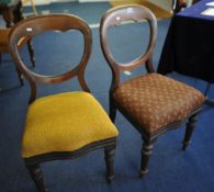 Two Victorian balloon back dining chairs with turned legs