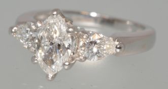 A fine diamond three stone ring, with central marquise cut diamonds approximately 2ct total