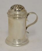 Silver castor with handle and pierced cover, 8cm high, 84g