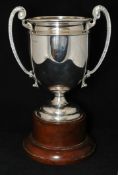 A Geo V silver twin handled trophy approx 18.60 oz on wood socle, 390cm high max