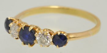 A sapphire and diamond five stone ring, size L