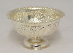 Victorian silver stem bowl with embossed decoration of scrolls and flowers approximately 155g, 7.5cm