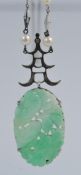 A Chinese jade pendant, with pagoda decoration, set with pearls, 35mm x 20mm