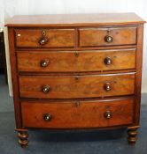 Victorian mahogany chest fitted with two short and three long drawers with knob handles and turned