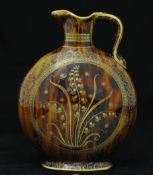 19th century pottery jug with tortoiseshell and gilt style decoration 22cm