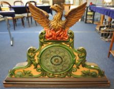 A large modern phoenix pub clock with carved wood casement, approx 128 cm wide x 93cm high