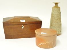 Victorian mahogany sarcophagus shaped tea caddy and stoneware bottle vase stamped RW after Robin