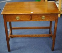 A polished oak hall table fitted with two drawers 81cm wide, 71cm high