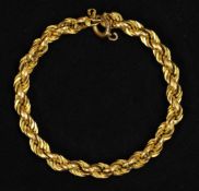 An 18ct gold bracelet with twist decoration, 9.20g