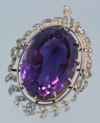 A fine large amethyst, diamond and seed pearl pendant, with diamond flower leaf outer border, 40mm x