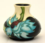 Small Moorcroft pottery `sea holly` vase, boxed 6cm