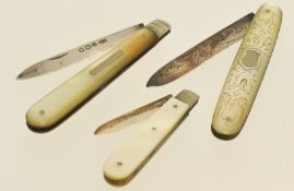 Three mother of pearl and silver bladed fruit knives