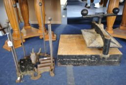 A heavy iron boot press stamped J and RM Woods, London, together with an old iron boot rack