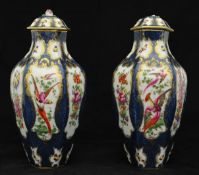 Pair of Sampson porcelain vases of Worcester design with covers, some damage, 28cm