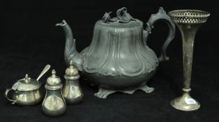 A pewter tea pot, three piece silver condiment set and silver and pierced spill vase (5)