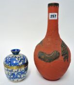 Chinese terra cotta bottle vase with bronze decoration of dragons, late 19th century (chip to rim)