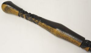A carved hardwood walking stick , 93cm long