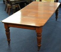 A late Victorian mahogany extending dining table with two extension leaves and wind handle, 240cm