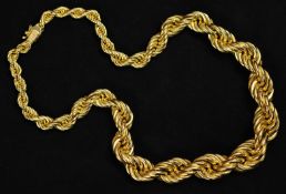 A heavy gold necklace of twist and graduated form, 40cm long, stamped.750, approx 74.50g