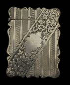 A silver card case with engraved floral decoration, approx 60g