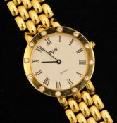 A modern Quartz 18ct gold Ladies wrist watch, Myer, with diamond set bezel, stamped.750, gross