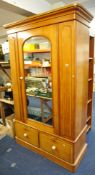 Victorian pine wardrobe with mirrored door and two short drawers below, fitted with white china