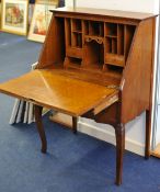 Oak bureau fall front enclosing a fitted interior with lower drawer on shaped legs 77cm wide