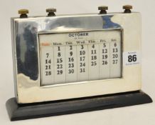Silver framed perpetual calendar with wood surround 15cm