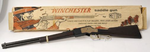 A Mettoy Replica Toy Winchester Saddle Gun with original box, 84cm