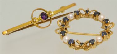 A 9ct gold target brooch and a 9ct gold pearl and sapphire wreath brooch