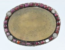 A large Middle Eastern brooch, 70mm x 52mm (lacks two stones)
