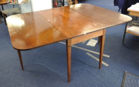 Large 19th century mahogany drop flap dining table of rectangular form 130cm wide x 180cm opened