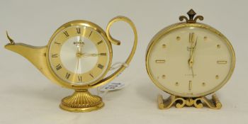 Two Swiza 8 day clocks in brass cases, 8cm.