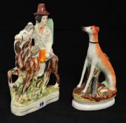 A 19th Century Staffordshire flatback figure of a young man riding a goat together with a